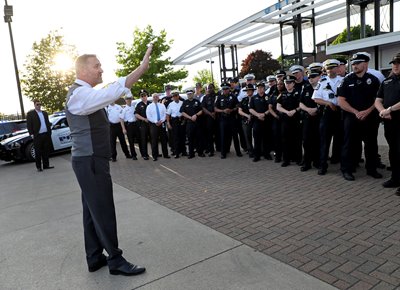 Ohio Attorney General Dave Yost greets police officers.