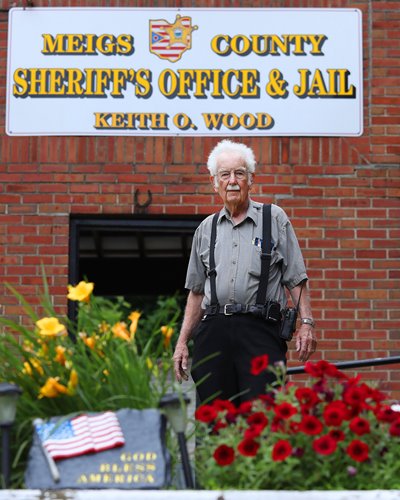 Howard Mullen stands in front of the Meigs County Sheriff's Office & Jail.